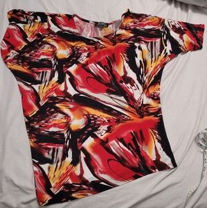 Ladies Artizan asymmetrical silky top.  Can be worn super sexy off the shoulder.